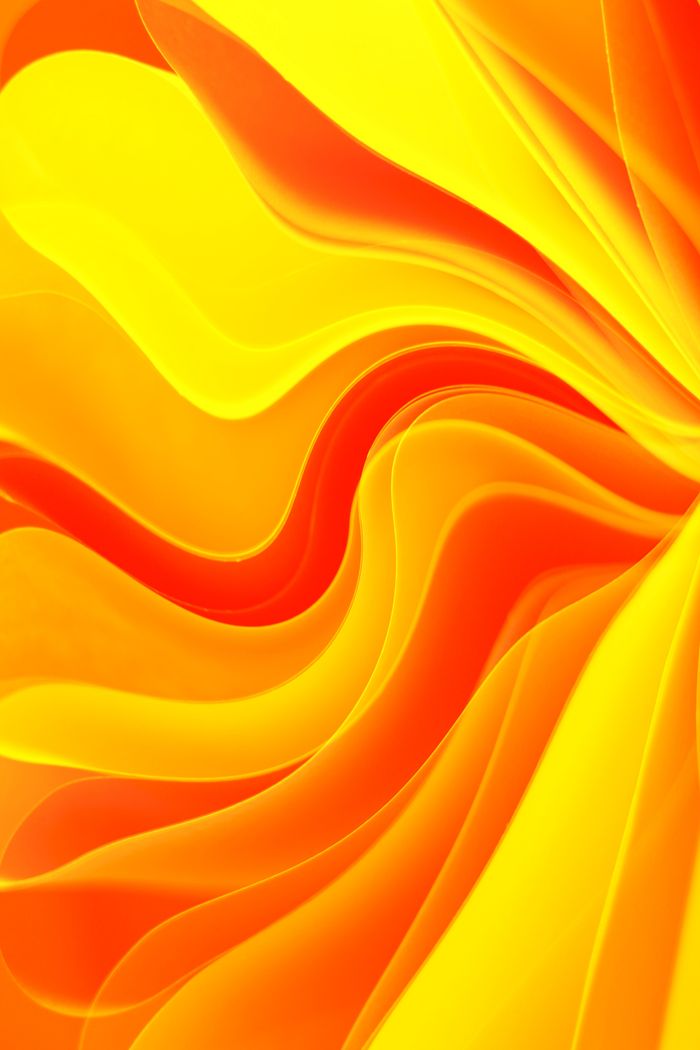 Colorful abstract design with flowing yellow and orange swirls, evoking warmth and vibrancy.
